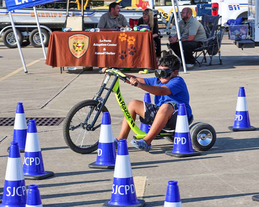 National Night Out child riding a trike
